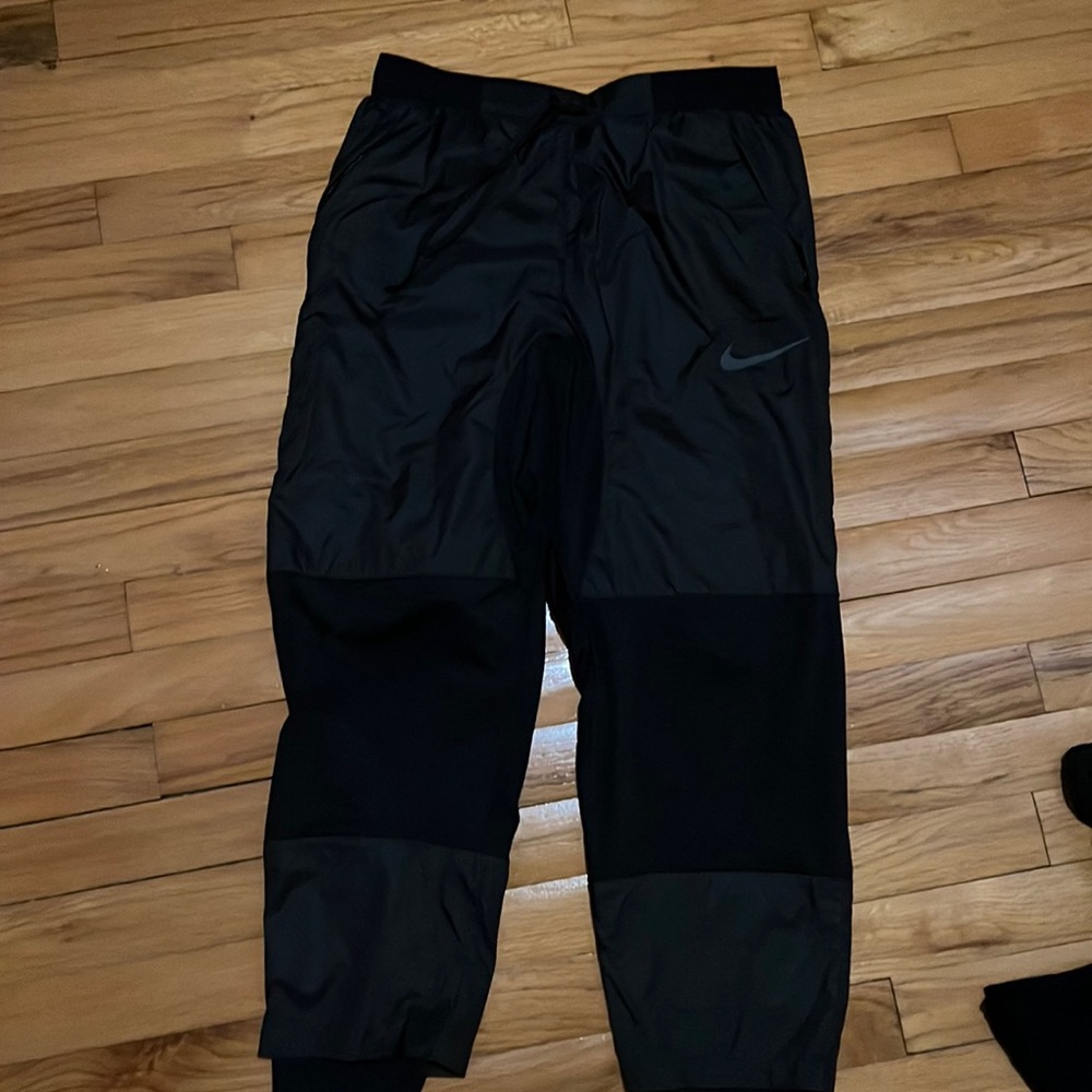 Nike running track pants, sz small, black. Like new. Worn twice.